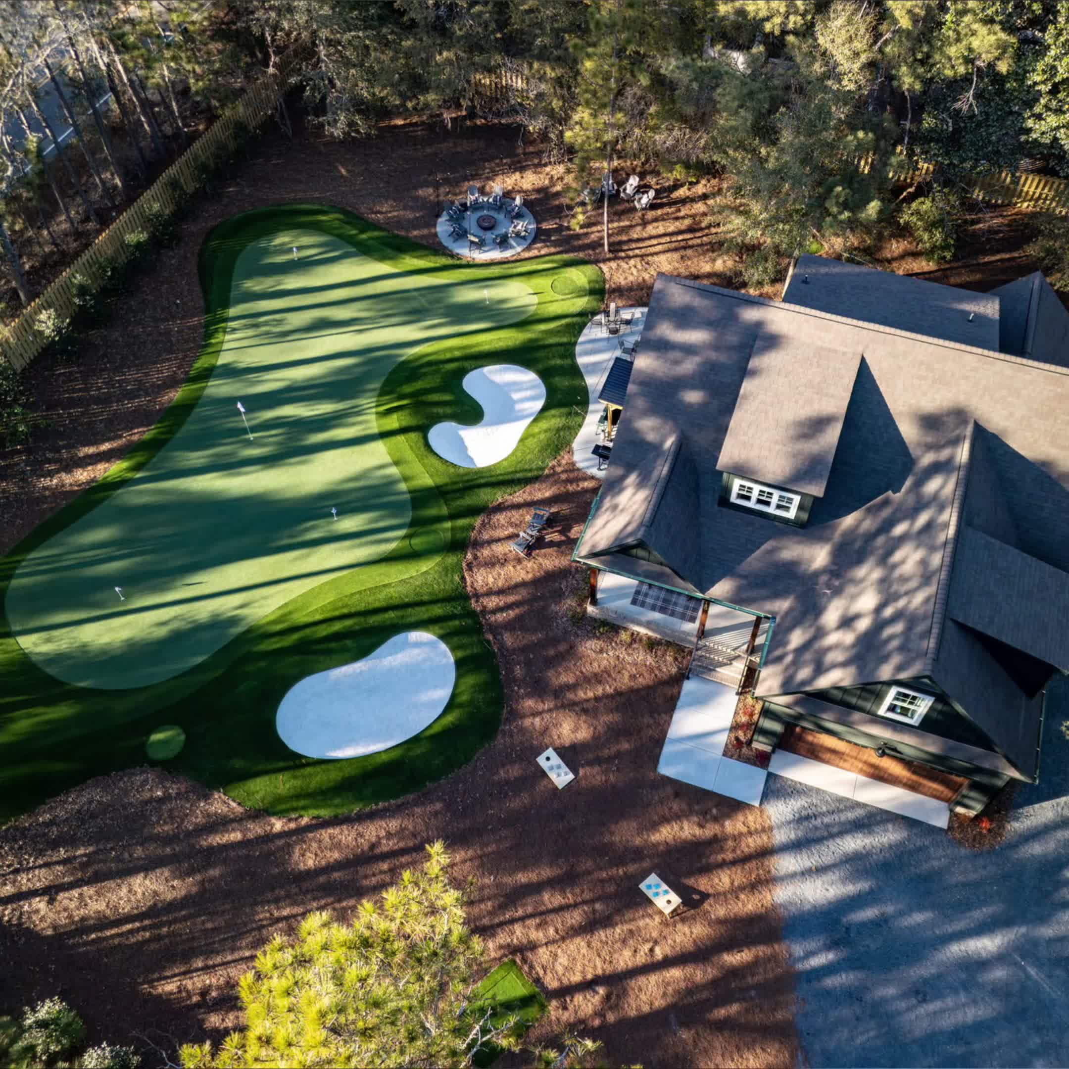 Aerial view of the house and short-game complex